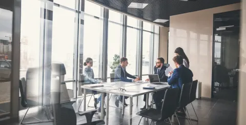 Group of people working together in a meeting room