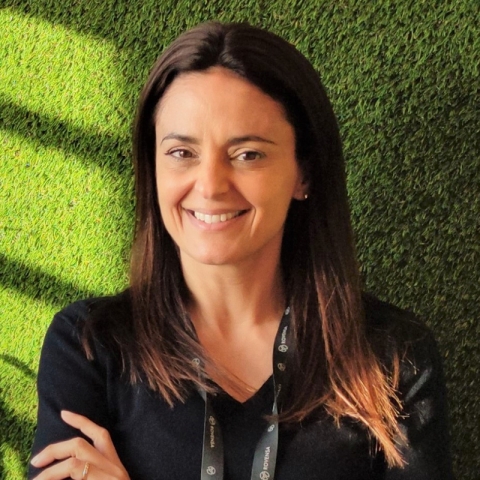 photo of Paula Glória, Rovensa Human Resources Director Portugal, with grass background